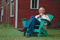 Ted sitting in an adirondack chair